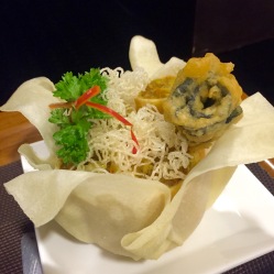 Spring rolls and fried purple flower